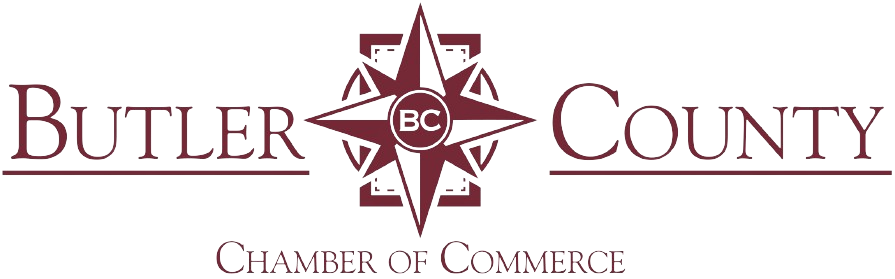 A red and white logo for the bc chamber of commerce.